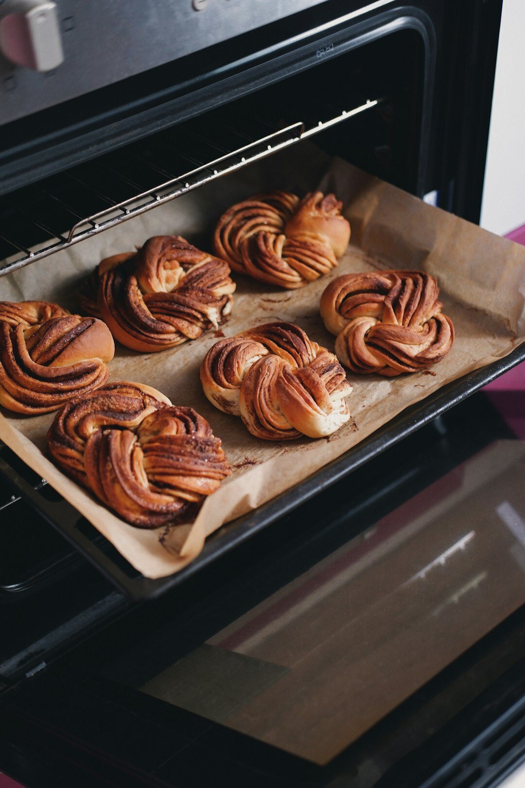 Freshly baked Czech buchty pastries on a cooling rack