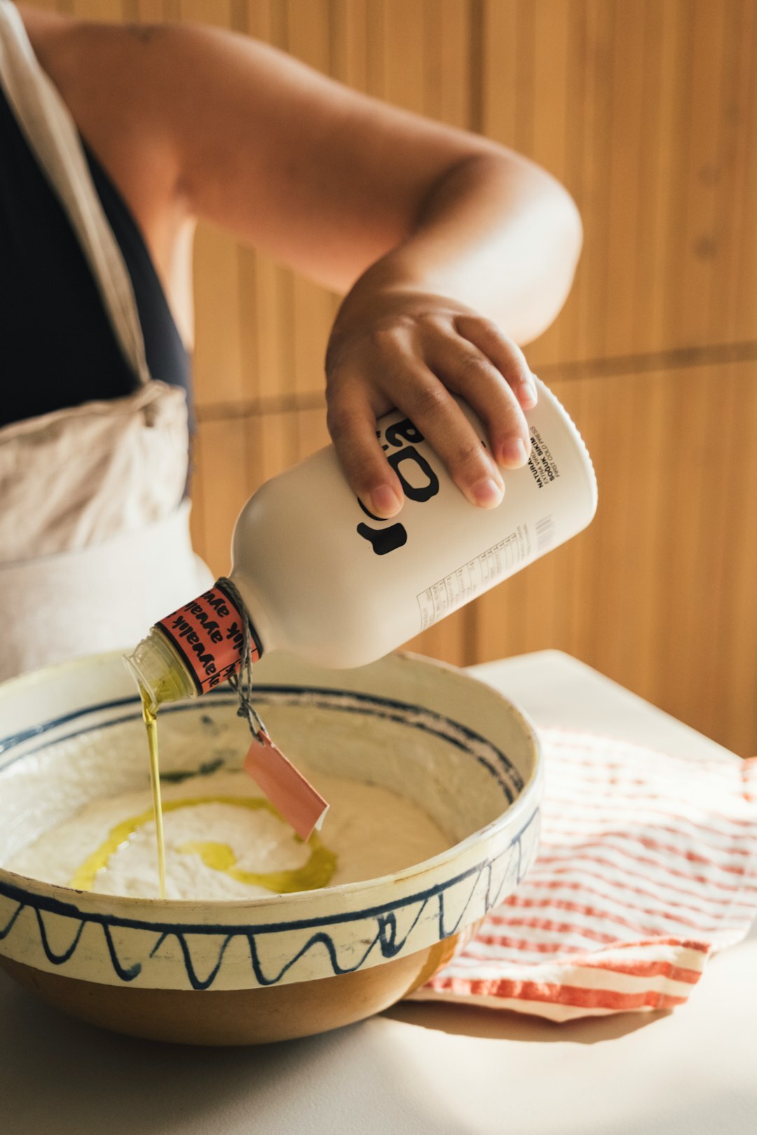 measuring flour in bowl